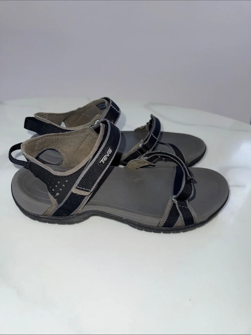 Teva women’s Black and Gray Adjustable Strap Sandals